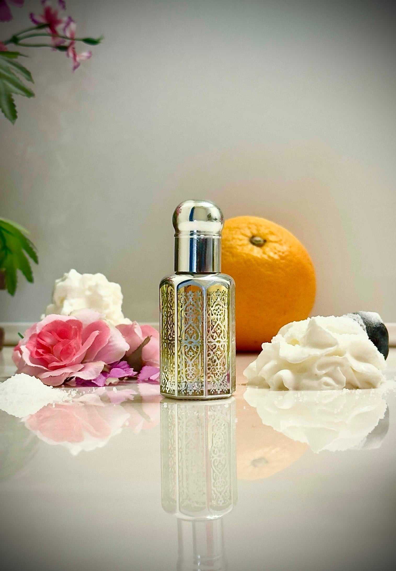 Silver perfume bottle with tropical fruits