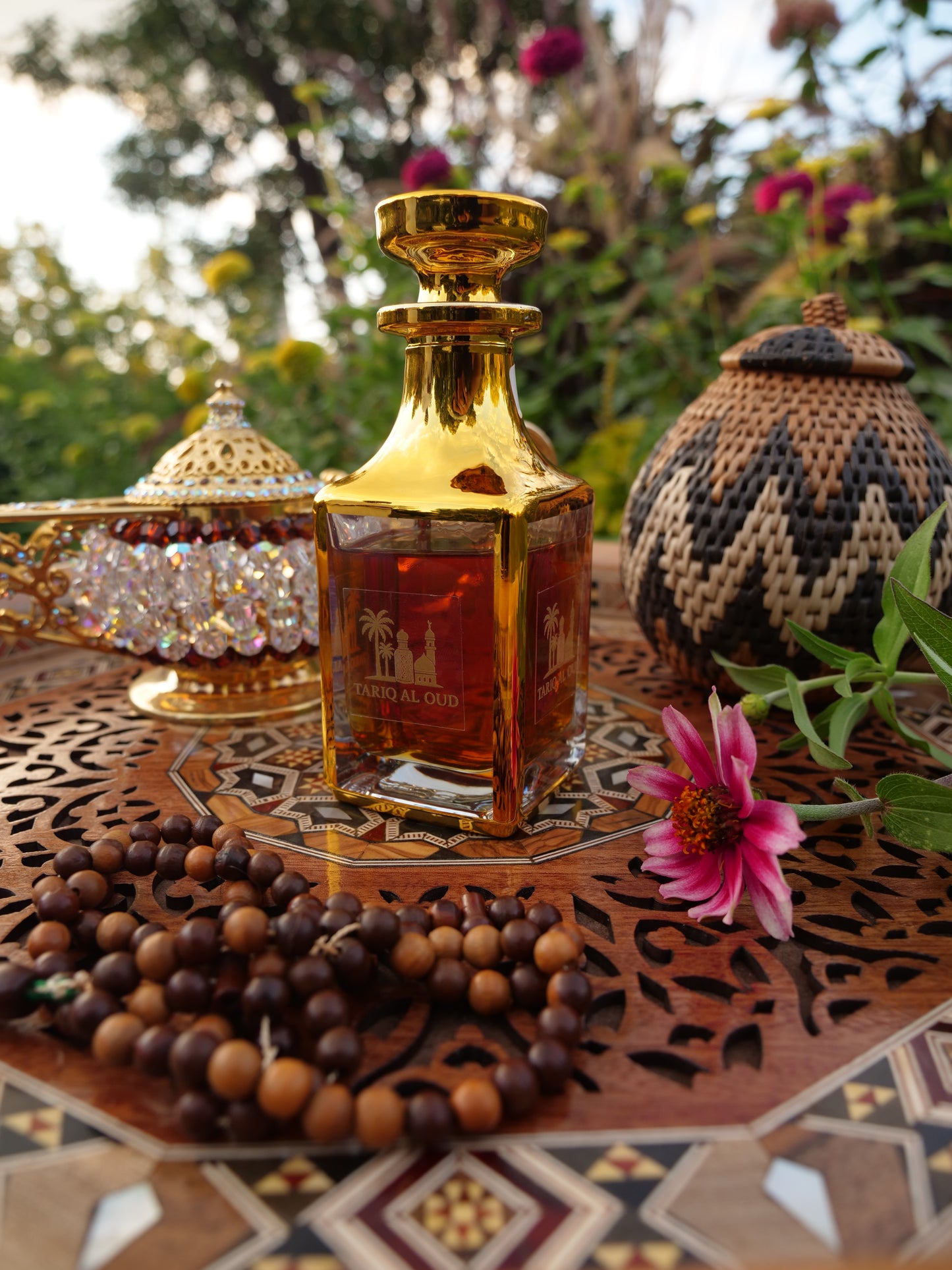 Decorative golden perfume with intricate design